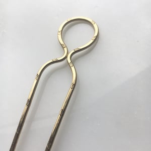 Image of stamped loop hair pin 