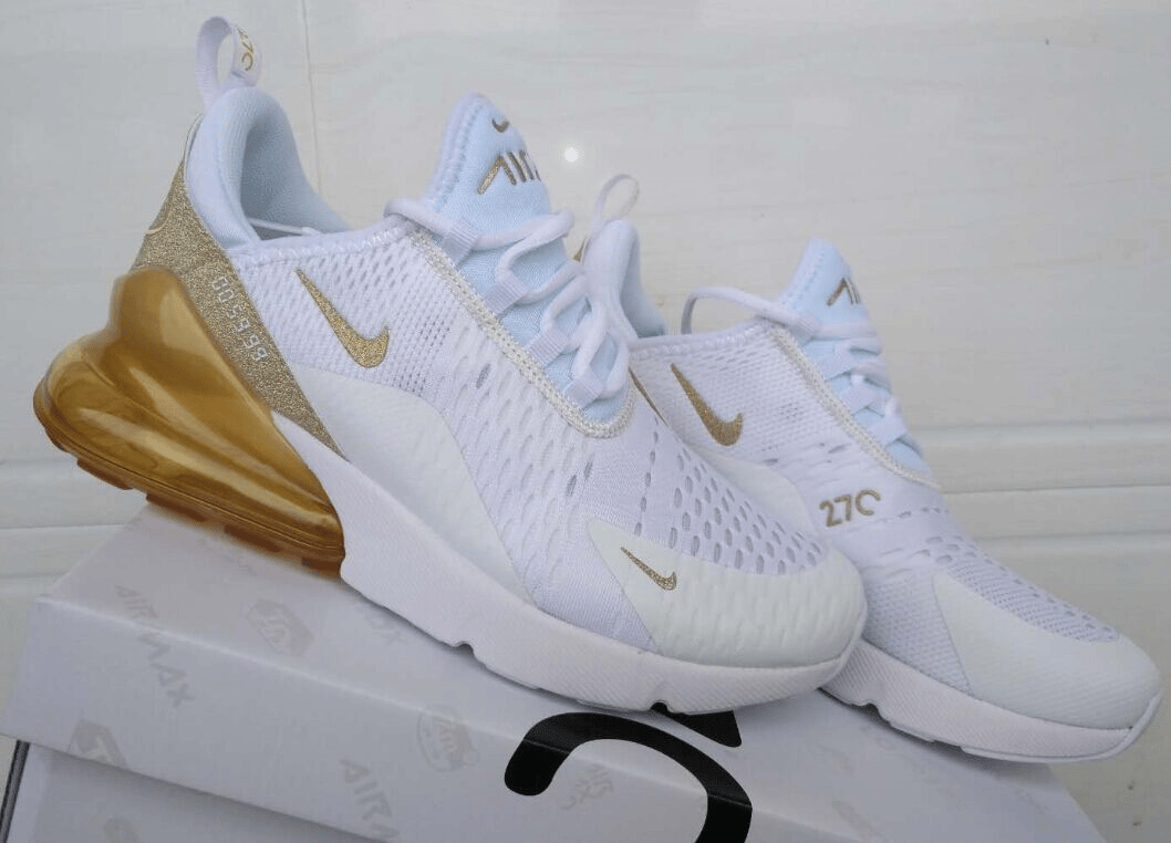 white and gold nikes womens