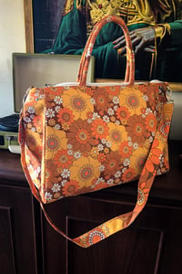 Daytripper Overnight Bag in Pushing Daisies Brown and Orange