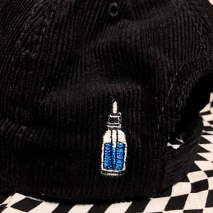 Image of Pink Sunshine black corduroy strapback 