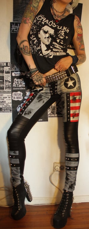 Image of Detailed denim/fauxleather pants with stars and studs