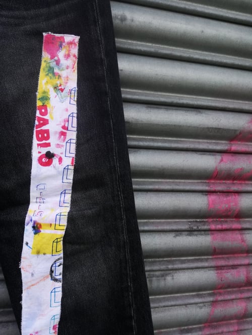 Image of 'What's it all worth?' Custom black Levi's