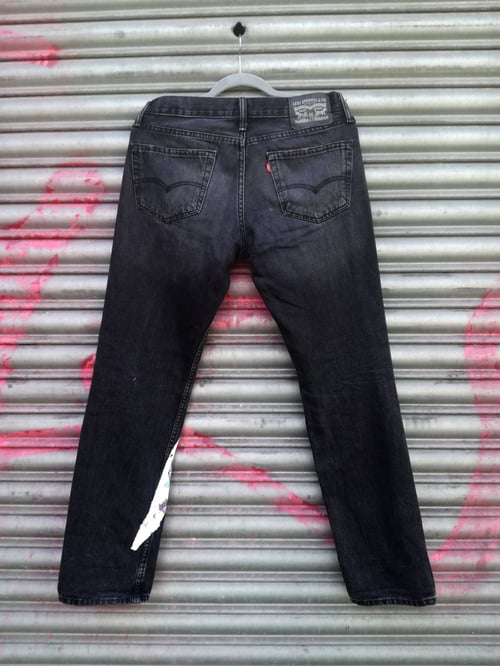 Image of 'What's it all worth?' Custom black Levi's