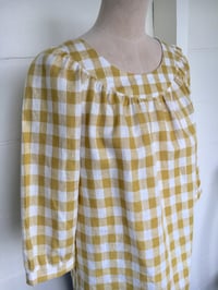 Image 1 of The Mustard Check Smock Top