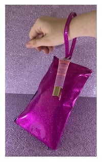 Lavish lip gloss clutch with MYSTERY GIFTS