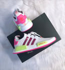 Image of Swarovski Bling Adidas NMD R1 Neon customized with SWAROVSKI® Xirius Rose-Cut Crystals.