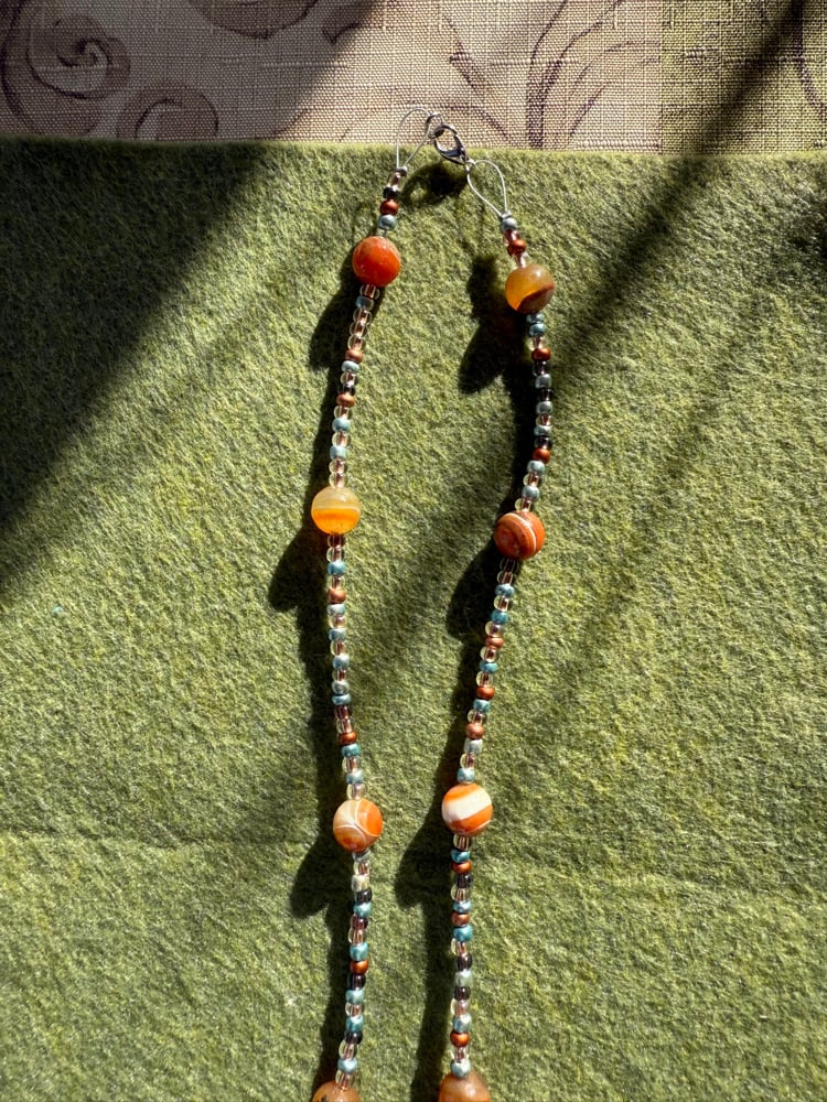 Image of Autumn faces necklace 🍂🍁🤎💛