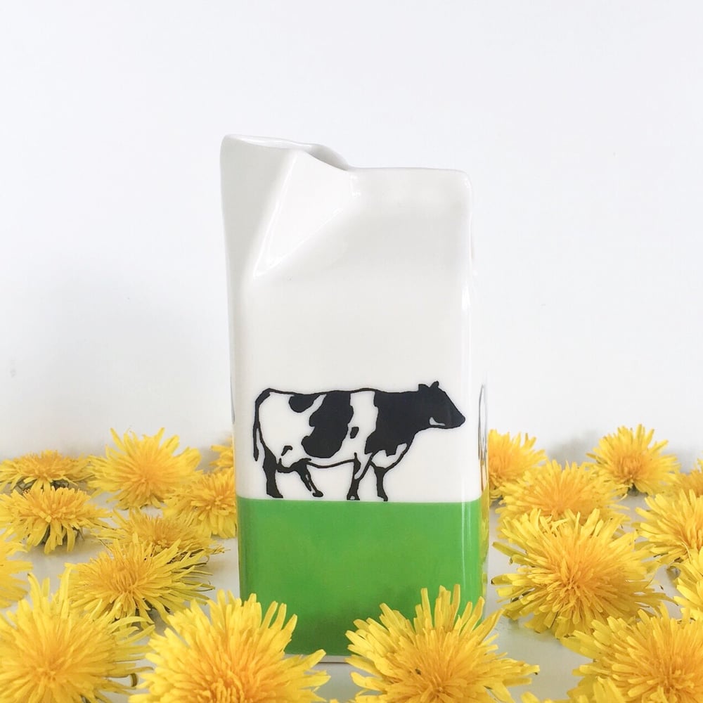 Image of Cows On Grass Milk Jug