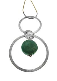 Image 3 of Three Way Sterling Silver Concentric Ring Pendant with Double Sided Centrepiece and Snake Chain.