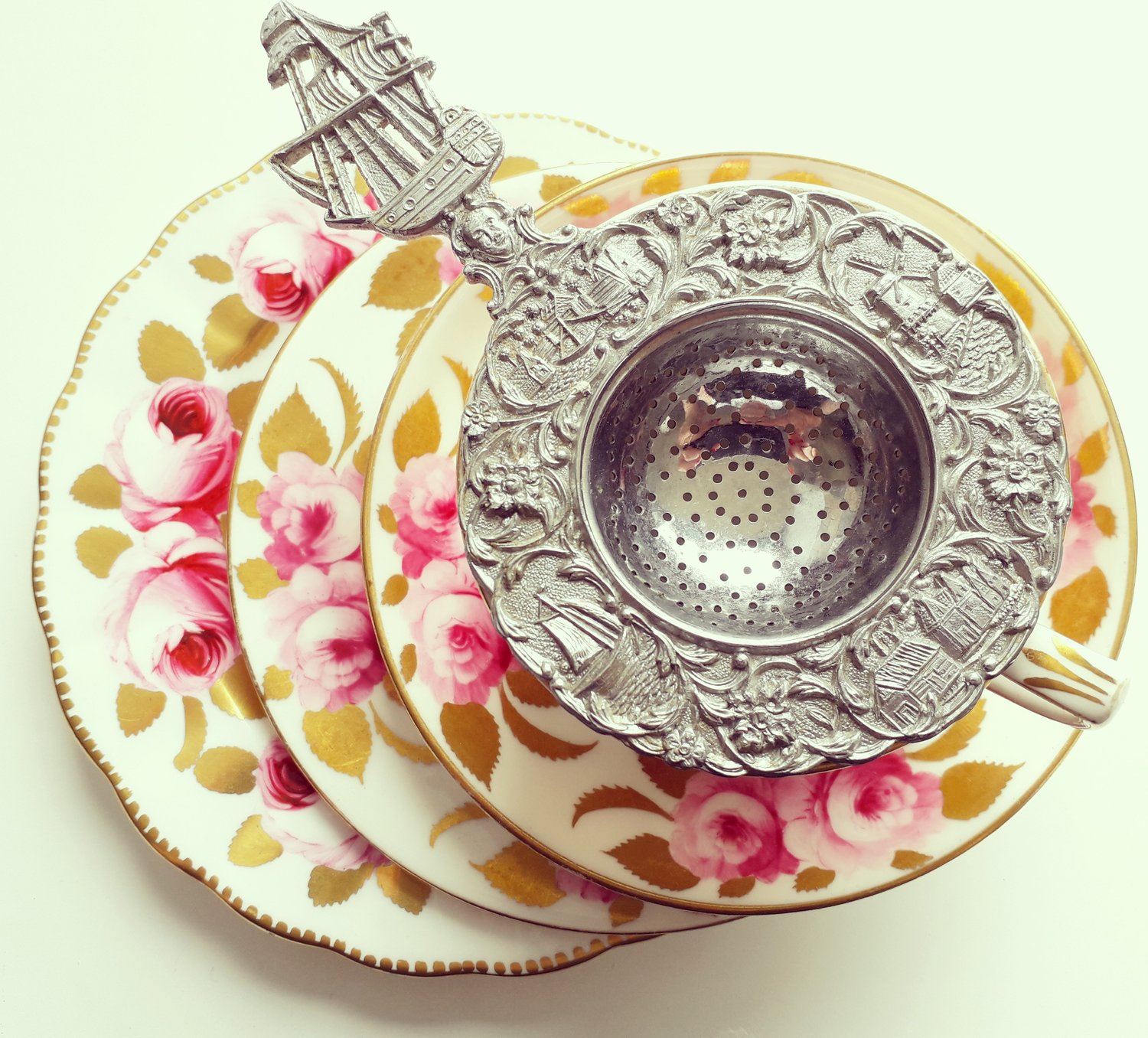 Image of Vintage silver plated tea strainer & stand