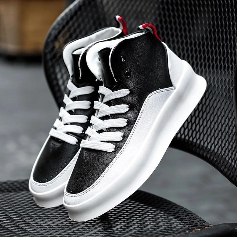 Image of Black and white leather sneakers