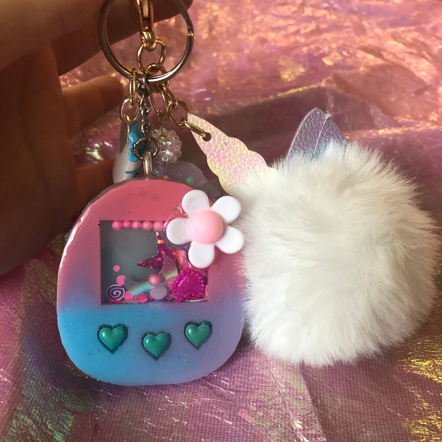 Image of BI PRIDE FLOWER GRL TAMA KEYCHAIN