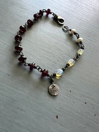 Image 2 of Ethiopian opal, pearl, and garnet charm bracelet