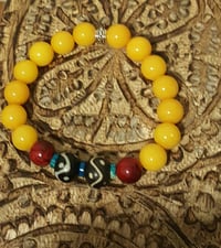 Image 1 of Gold, Red, and Teal Bracelet 