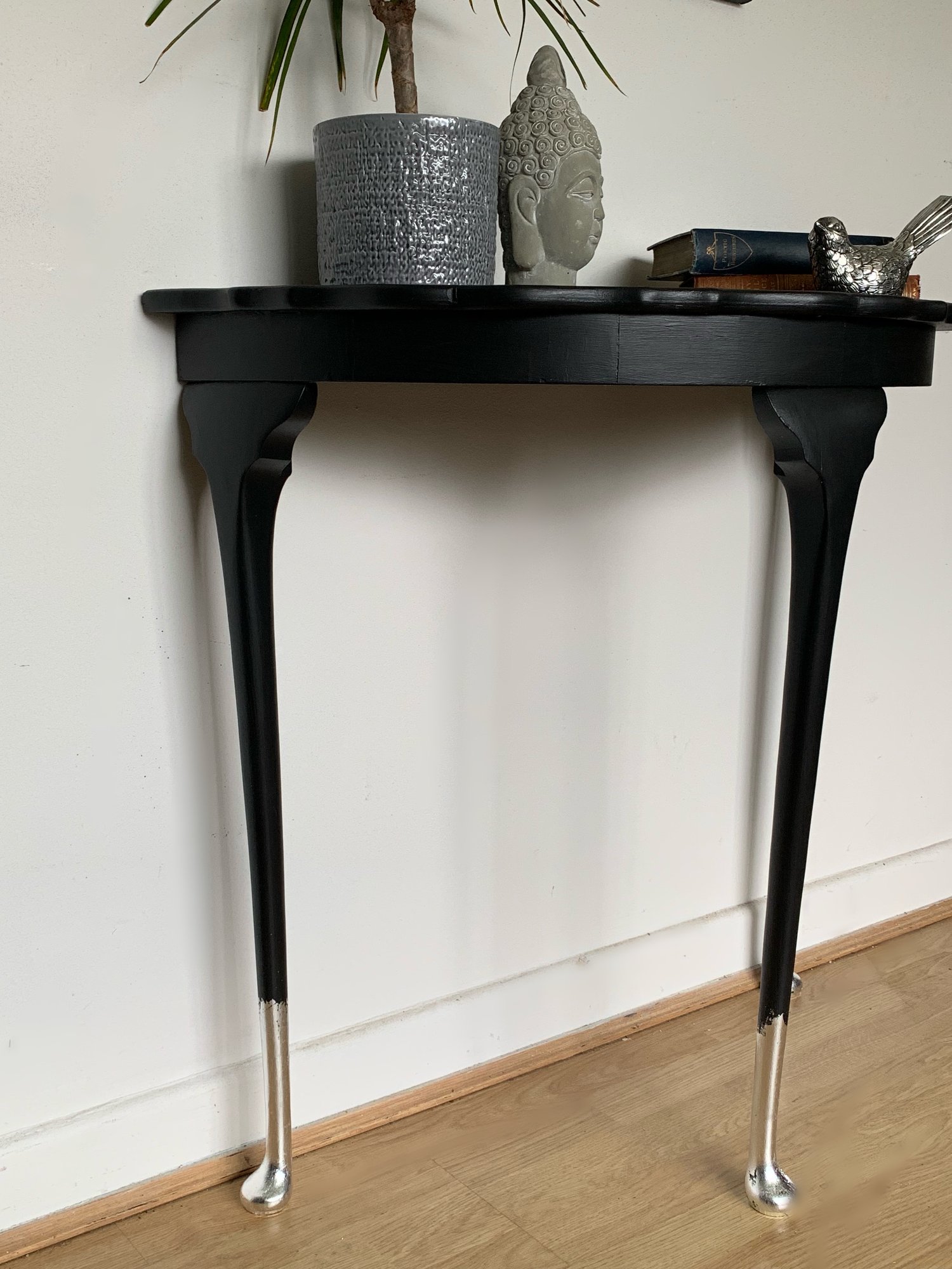 Image of Stunning black & silver leaf half moon table