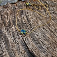 Image 1 of Caged Opal