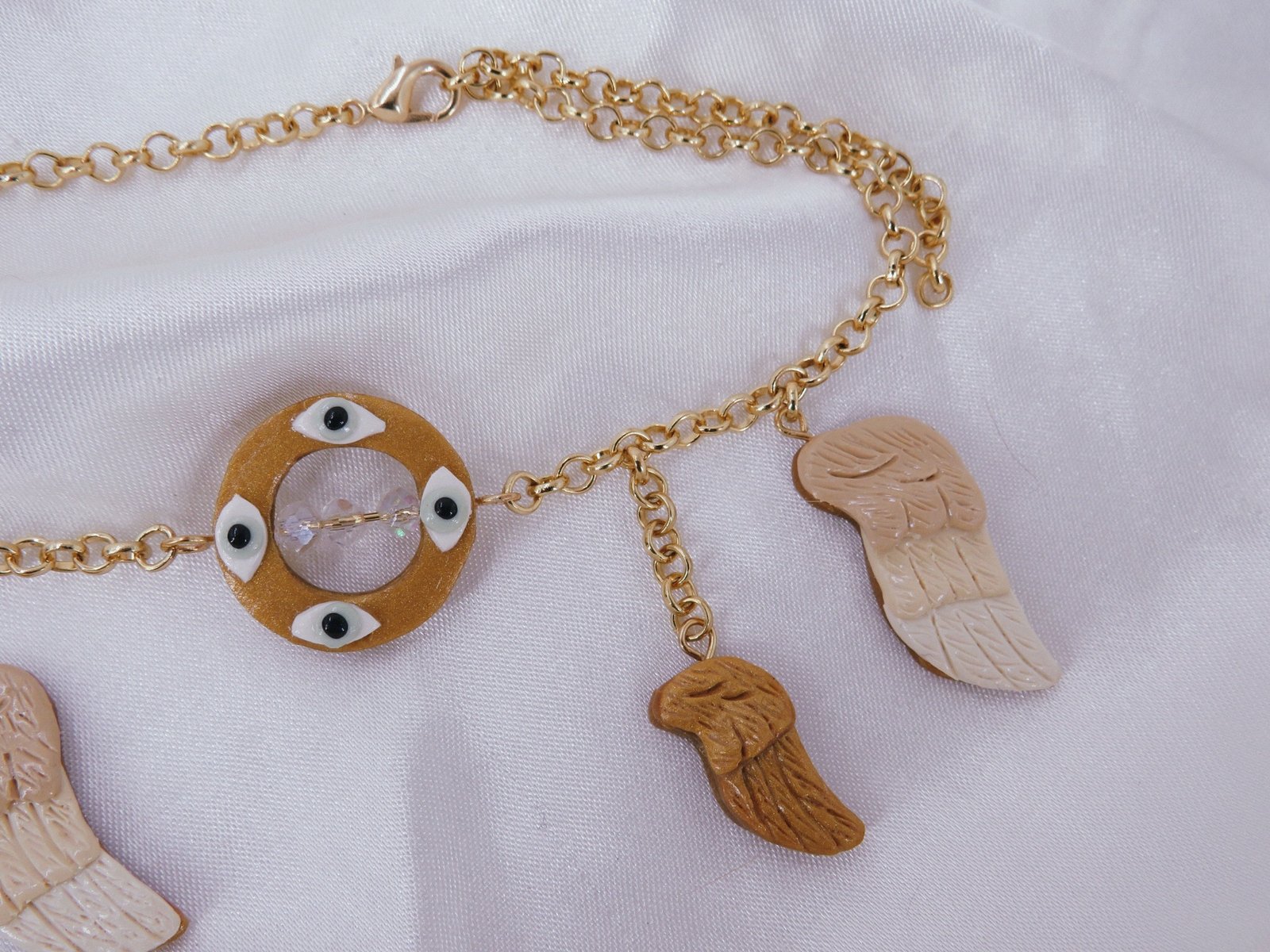 deconstructed biblically accurate angel necklace