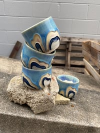 Image 1 of Set Of 4 Sky Blue Espresso Cups w.Petal Motif