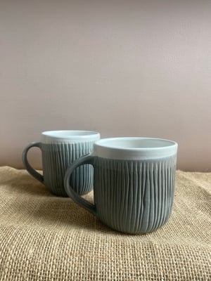 Image of carved mug grey