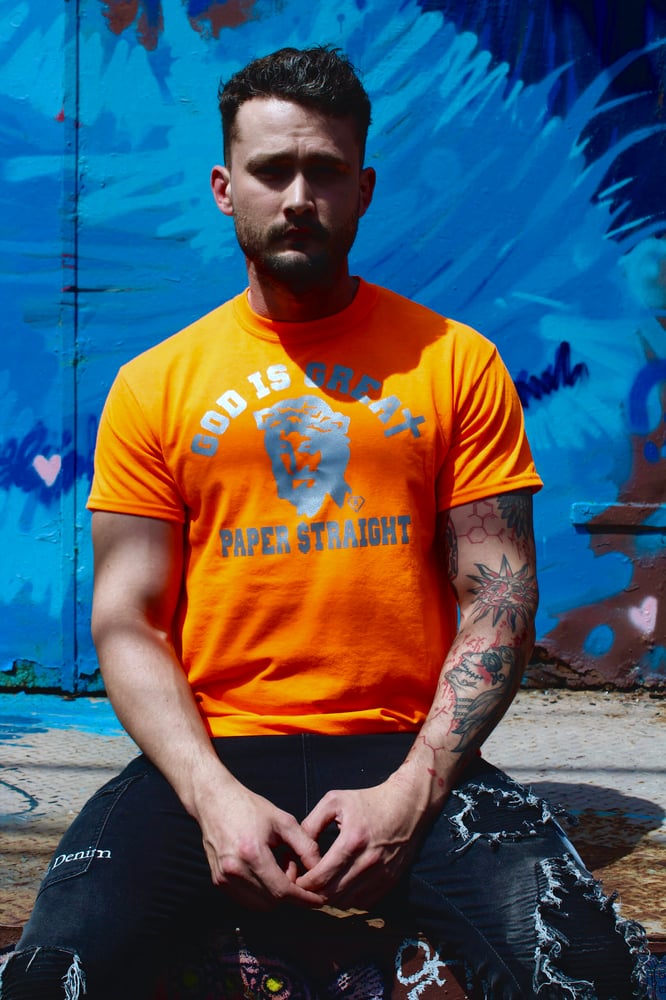 Image of GIGP$ NEON ORANGE BIG FACE REFLECTIVE TEE