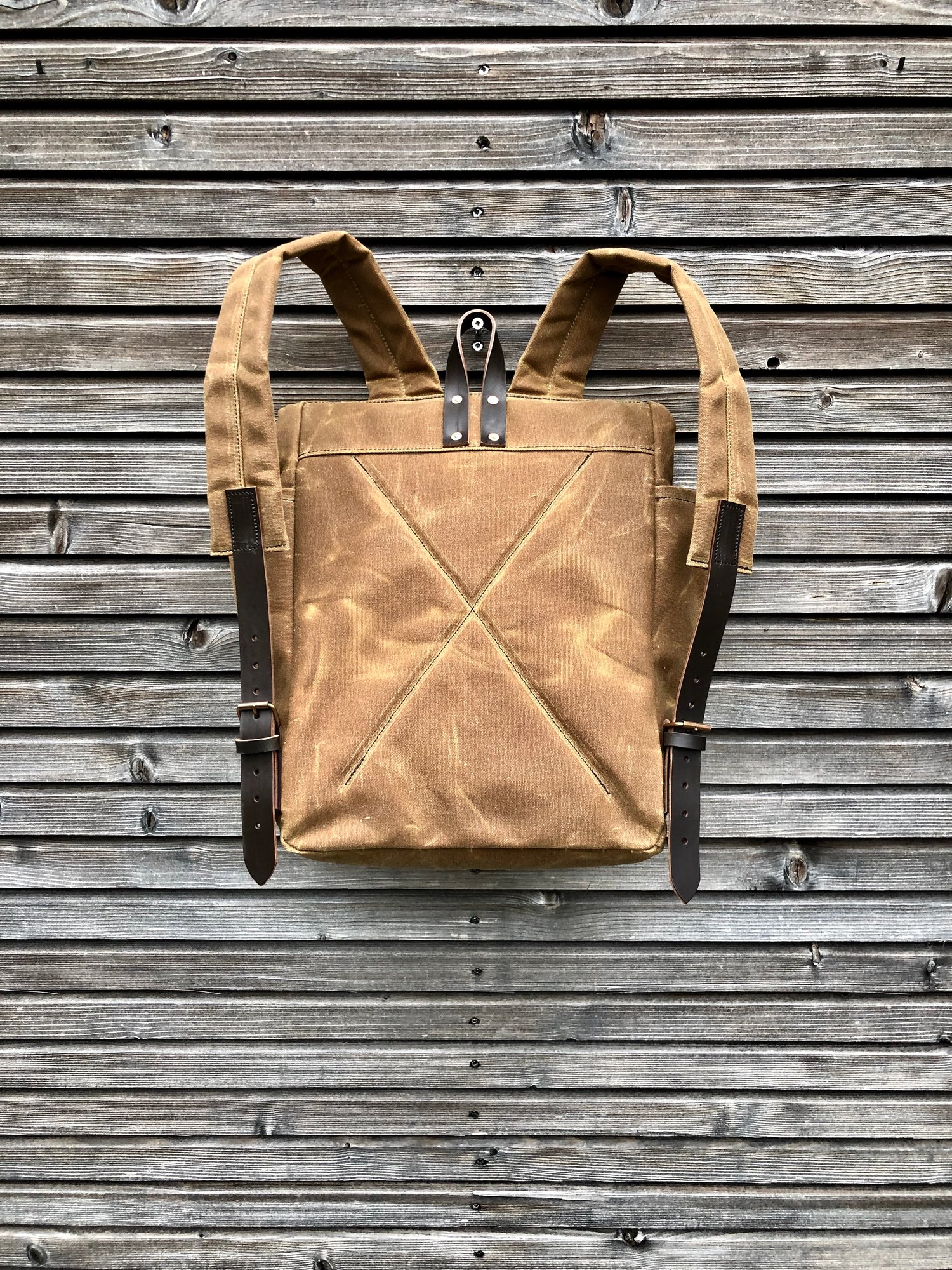 Image of Waxed canvas backpack with roll up top and double bottle pocket COLLECTION UNISEX