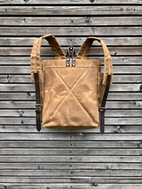 Image 4 of Waxed canvas backpack with roll up top and double bottle pocket COLLECTION UNISEX