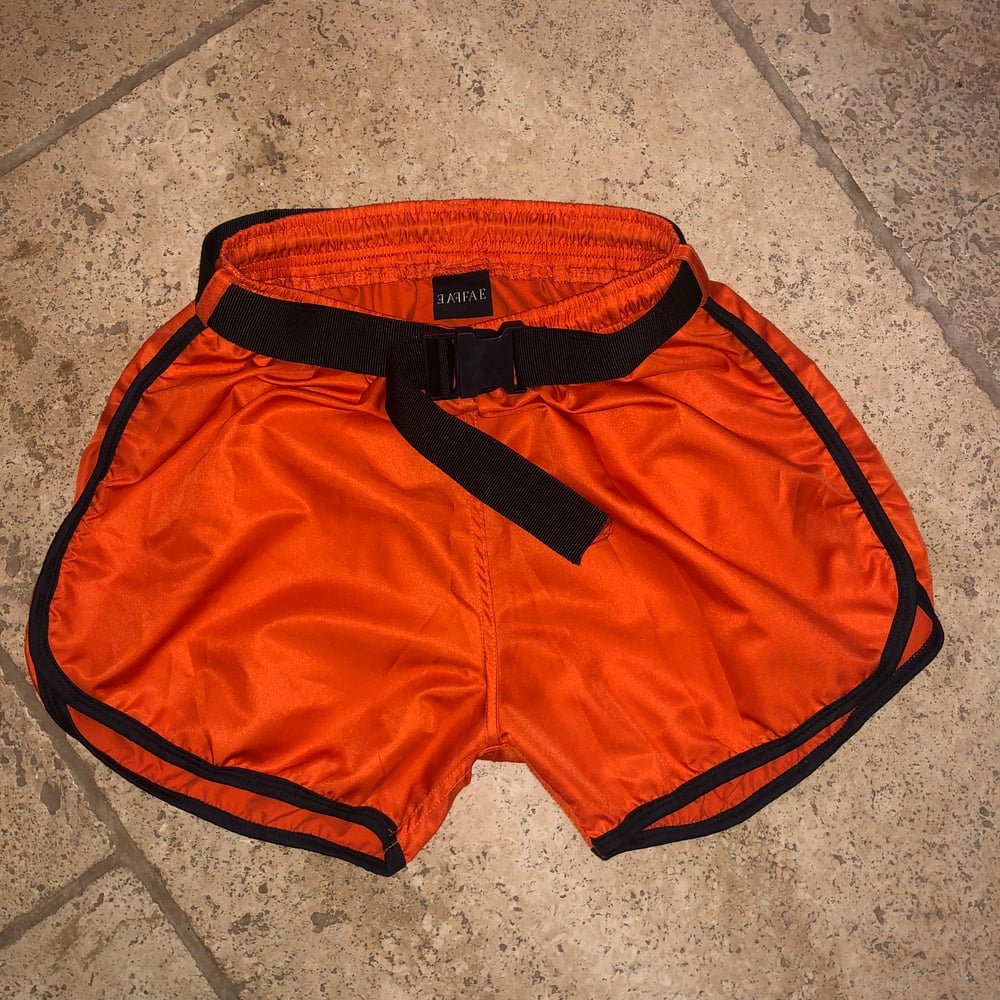 Image of BRIGHT ORANGE SHELL SHORTS