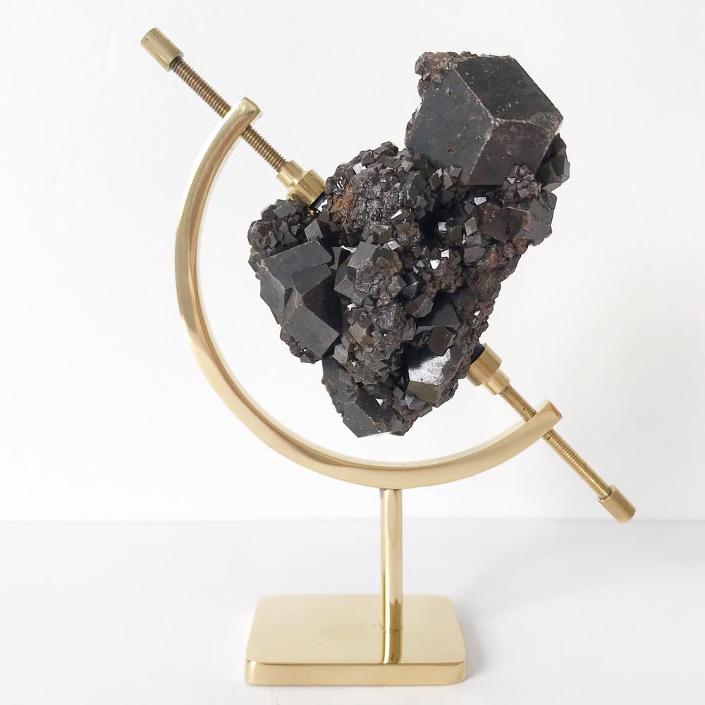 Image of Garnet no.24 + Brass Arc Stand