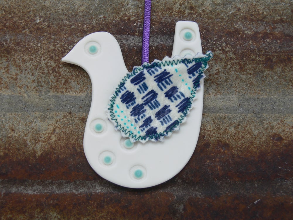 Image of Porcelain Bird with Fabric Wing