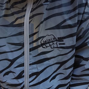 Image of Reflective Tiger Stripe Jacket with Embroidered Logo 