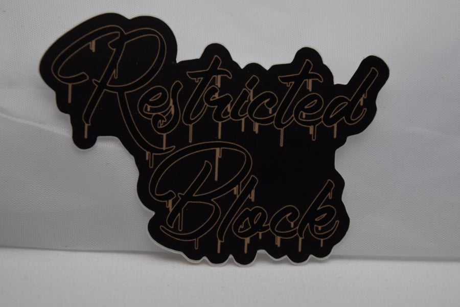 Image of Black/Gold Restricted.Block Sticker