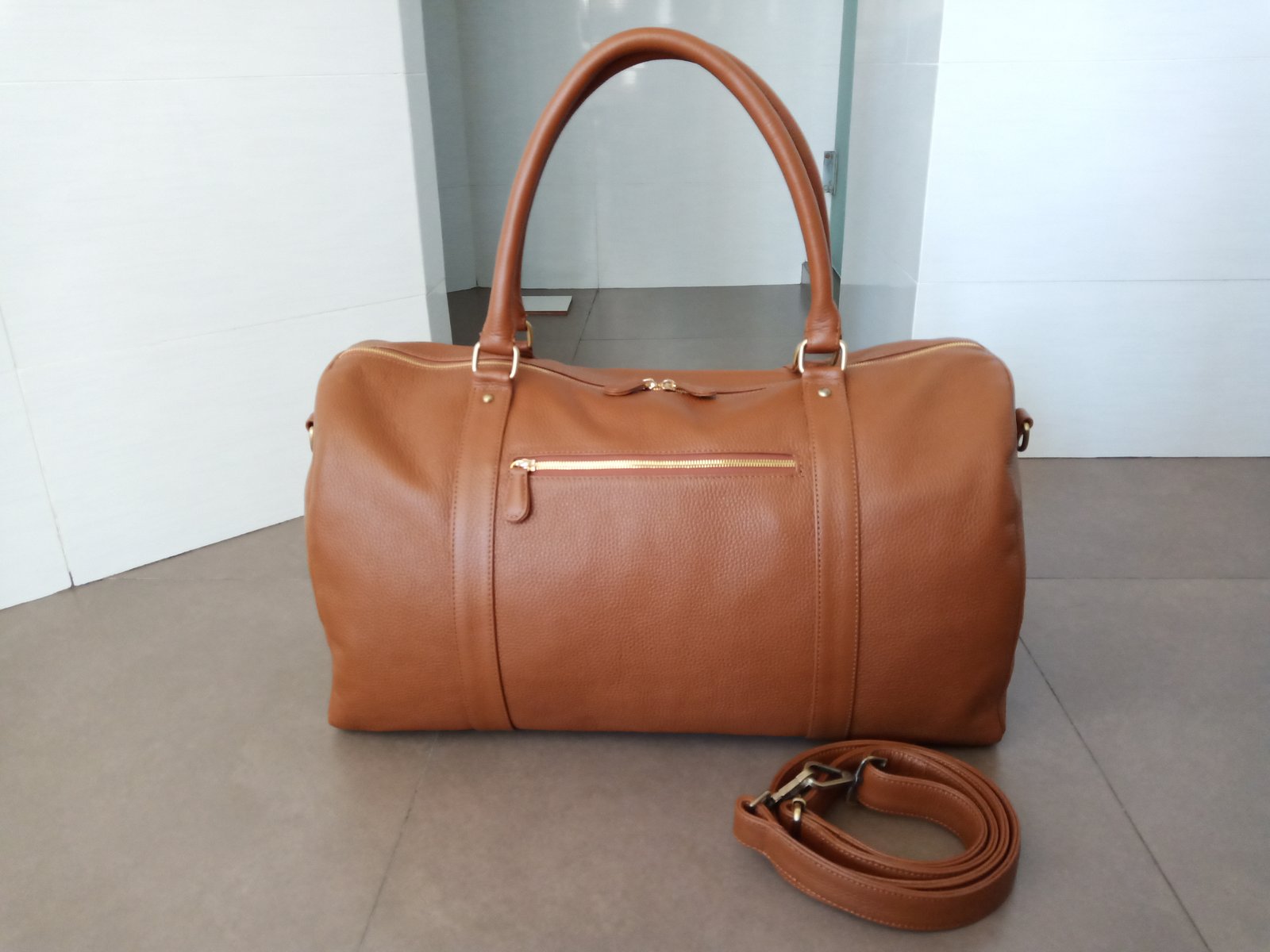 camel leather duffle bag