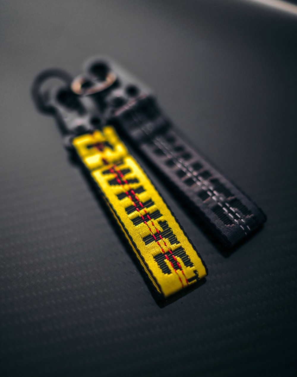 Custom “OFF-WHITE” keychain made with authentic material