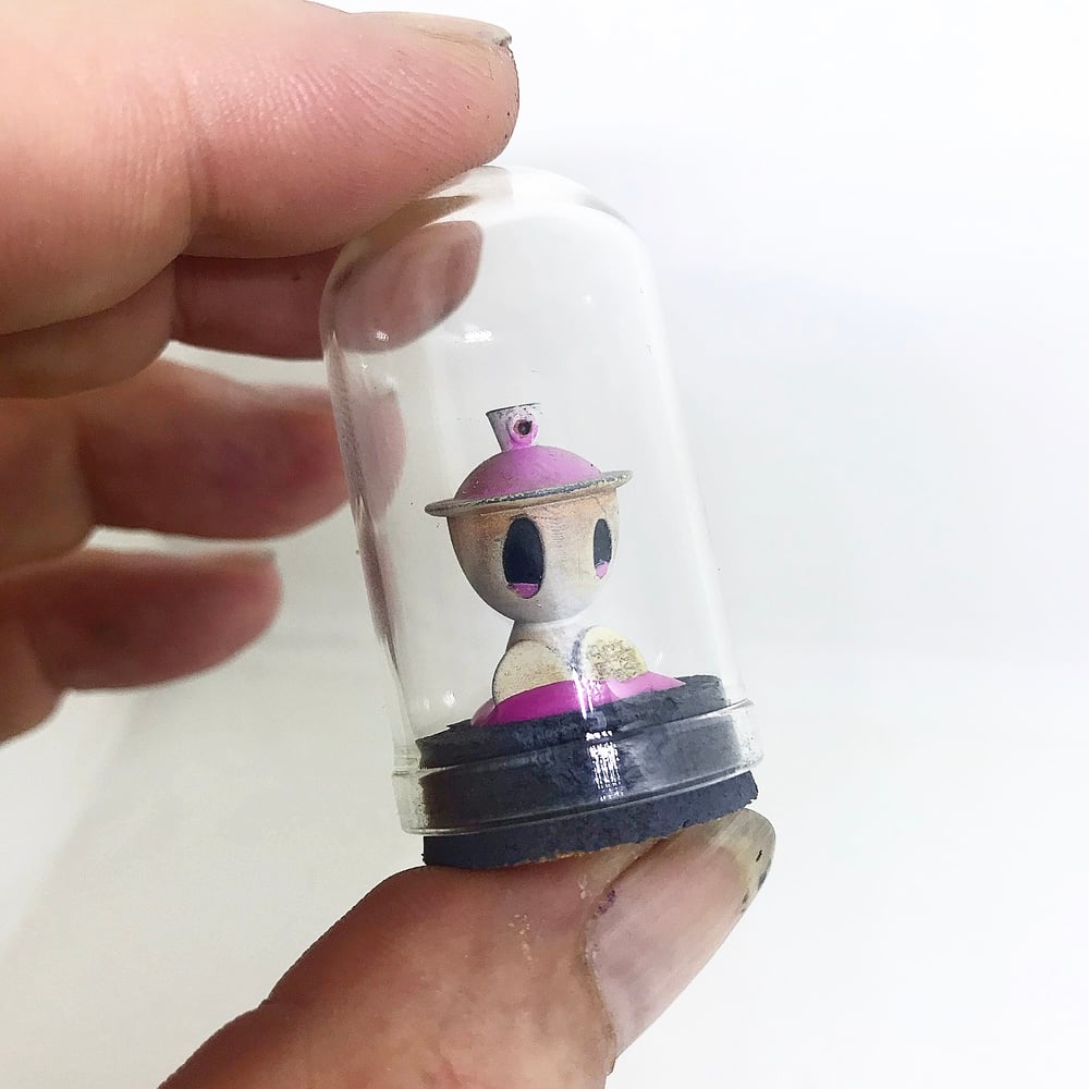 Image of White and pink microbot 