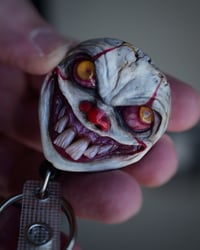 Image 4 of Handmade Pennywise Badge Reel Keychain 