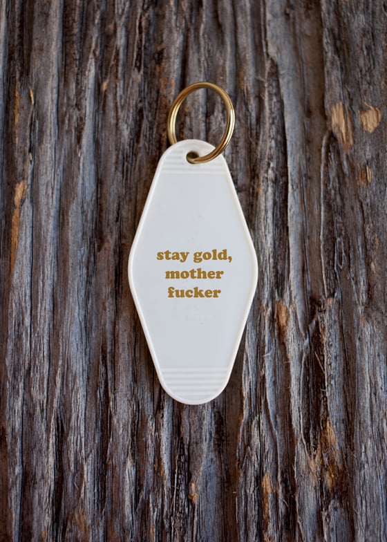 Image of stay gold keytag
