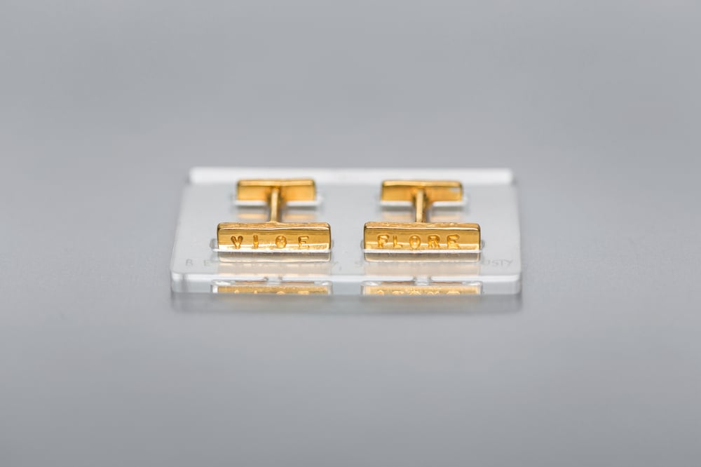 Image of gold plated silver cufflinks with inscription in Latin