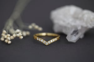 Image of 18ct gold white diamond set wishbone (chevron) ring