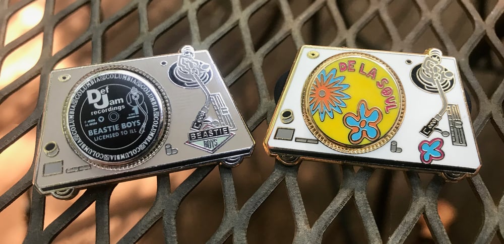 Image of Two Turntables and a MYFE.raphone.  