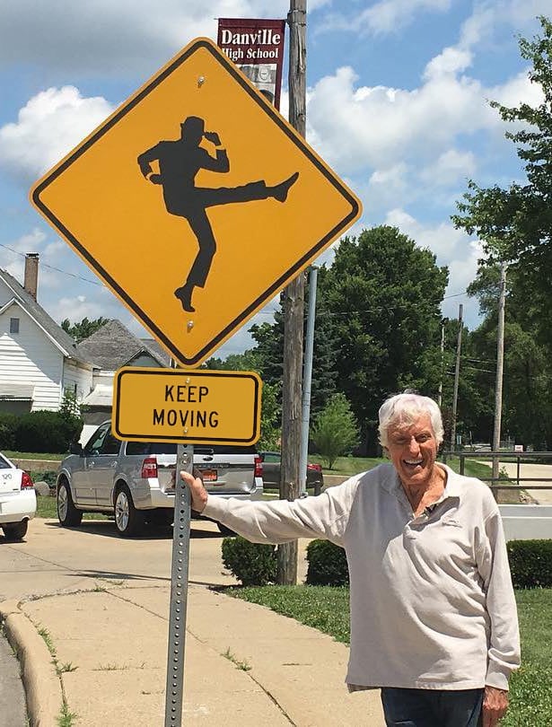 Image of Dick Van Dyke "Keep Moving" Sign