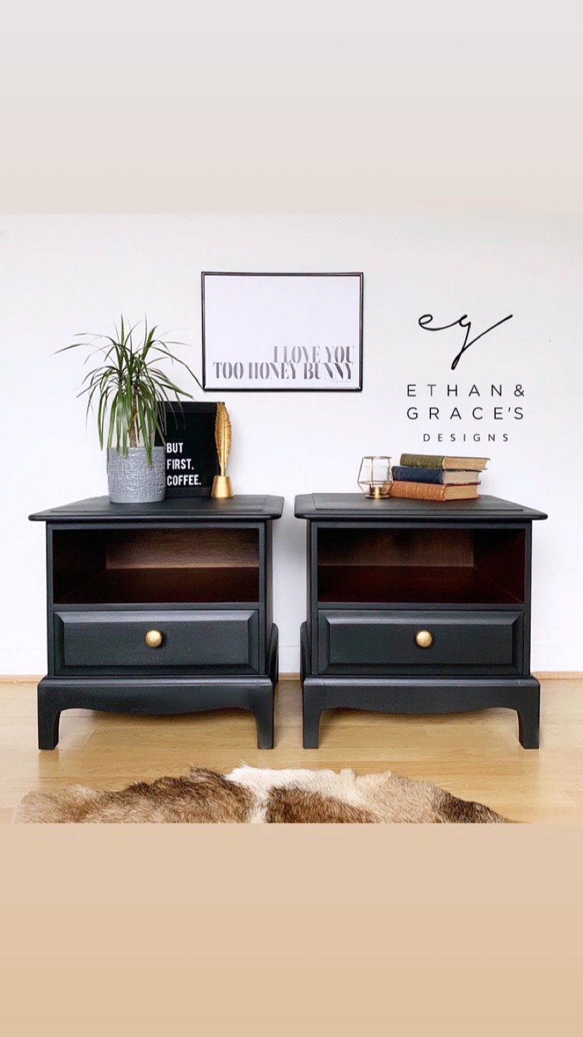 Image of ANY COLOUR A pair of black stag mahogany bedside tables.
