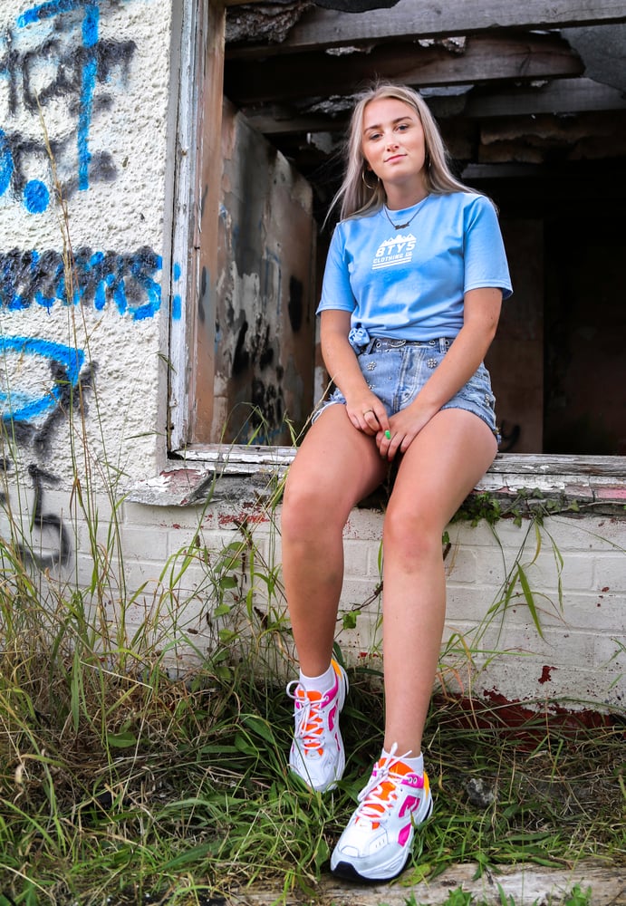 Image of 'MOUNTAIN SUNSET' TEE - BABY BLUE