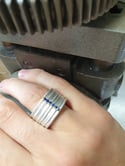 Wide band Strata ring set with sapphire. Sterling silver and 18ct gold