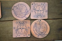 Tattoo designed coaster