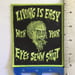 Image of Living is Easy with Your Eyes Sewn Shut Shrunken Head Woven Patch