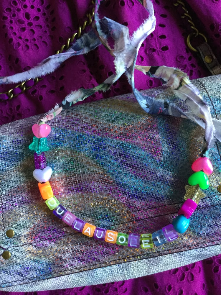 Image of Colliers/ bracelets en Liberty à messages et cœurs et étoiles 
