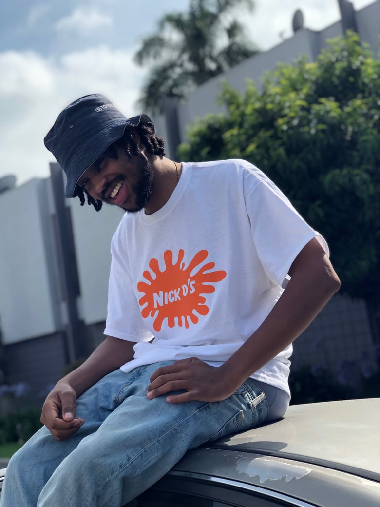Image of Nick D's Orange Splat T Shirt - White 