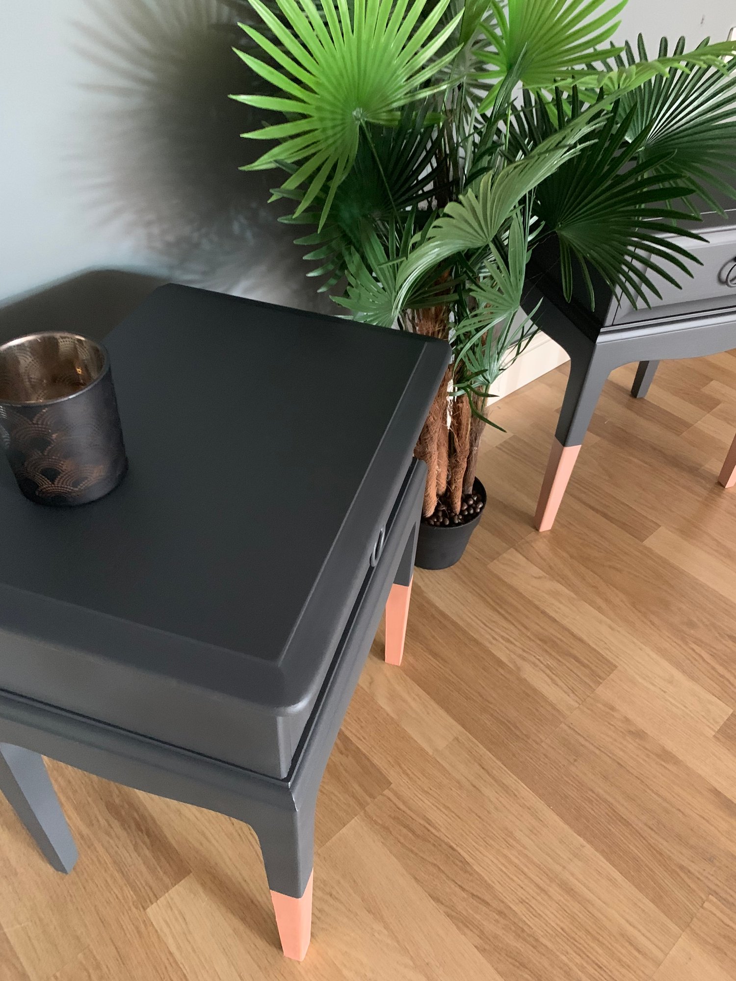 Image of A pair of dark grey & rose gold stag bedside tablesk