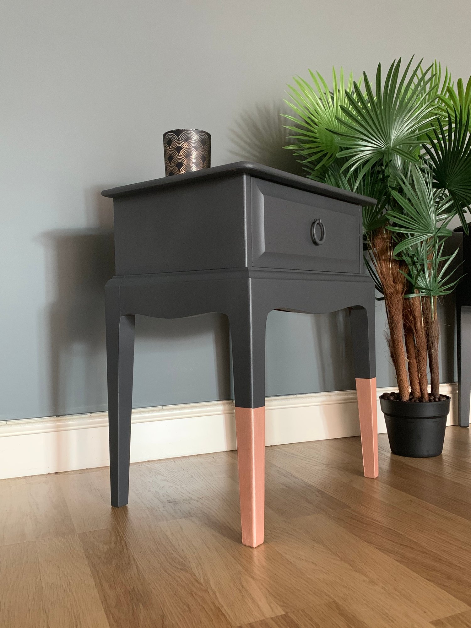 Image of A pair of dark grey & rose gold stag bedside tablesk