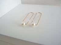 Image 1 of One pearl earrings